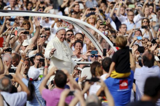 Pope Francis arrives to lead a meeting with young people during his two-day pastoral visit in Turin, Italy, June 21, 2015. REUTERS/GIORGIO PEROTTINO